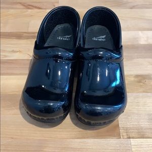 Dansko black patent leather closed back clogs